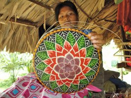 weaver working on basket